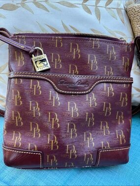 Dooney & Bourke Burgundy Monogram Crossbody with Gold Hardware coated canvas